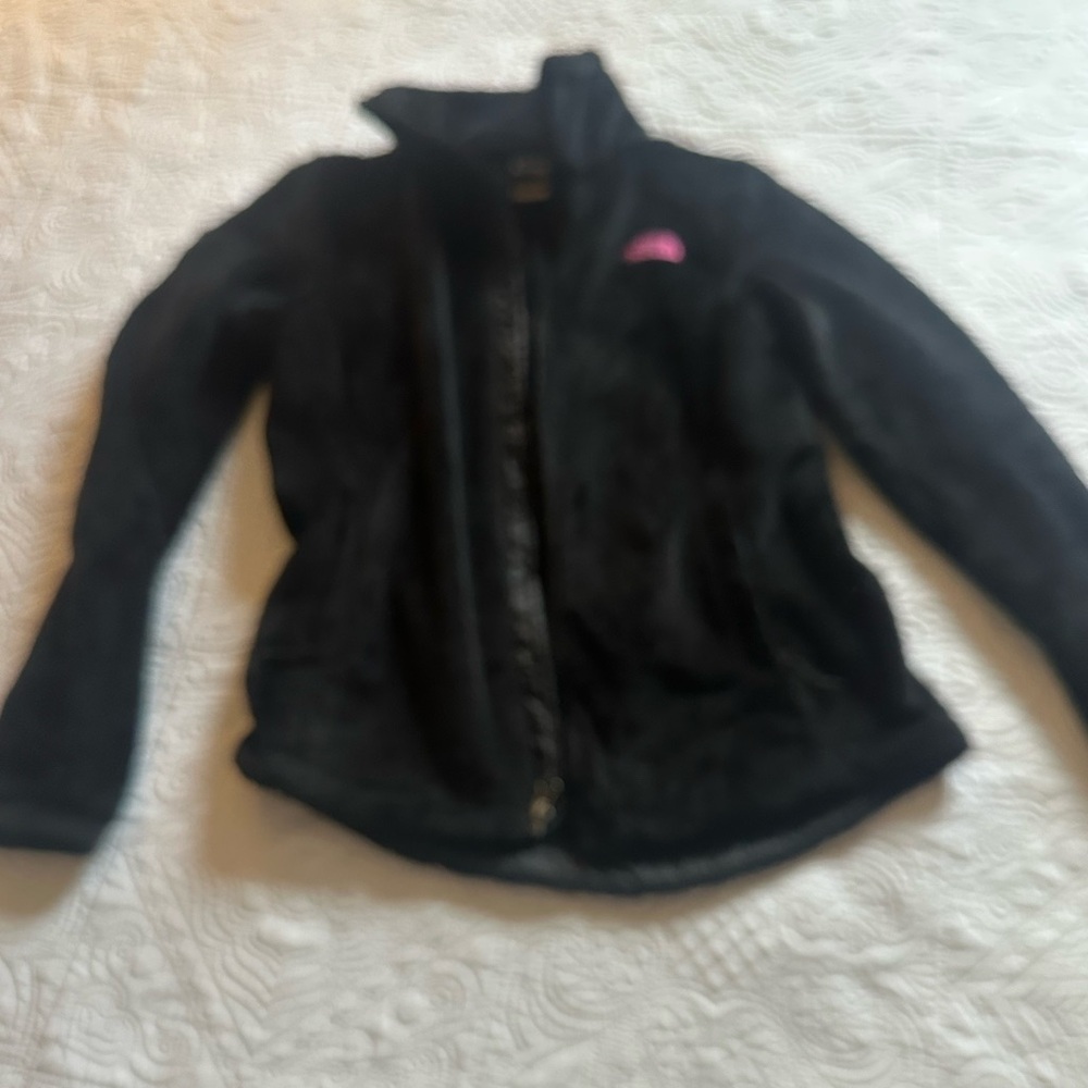 The North Face woman’s Black Jacket with Pink Logo